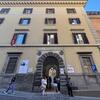 Students walking through the entrance of the Temple University Rome campus